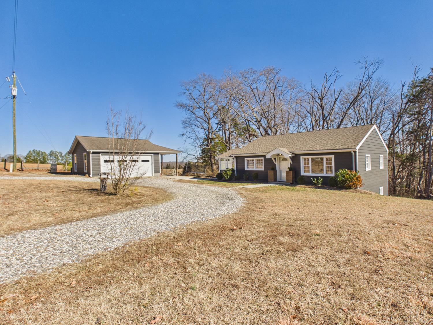1482 First Rock Road Prospect, VA 23960 - Photo 25 of 30 a front view of a house with a yard covered in snow