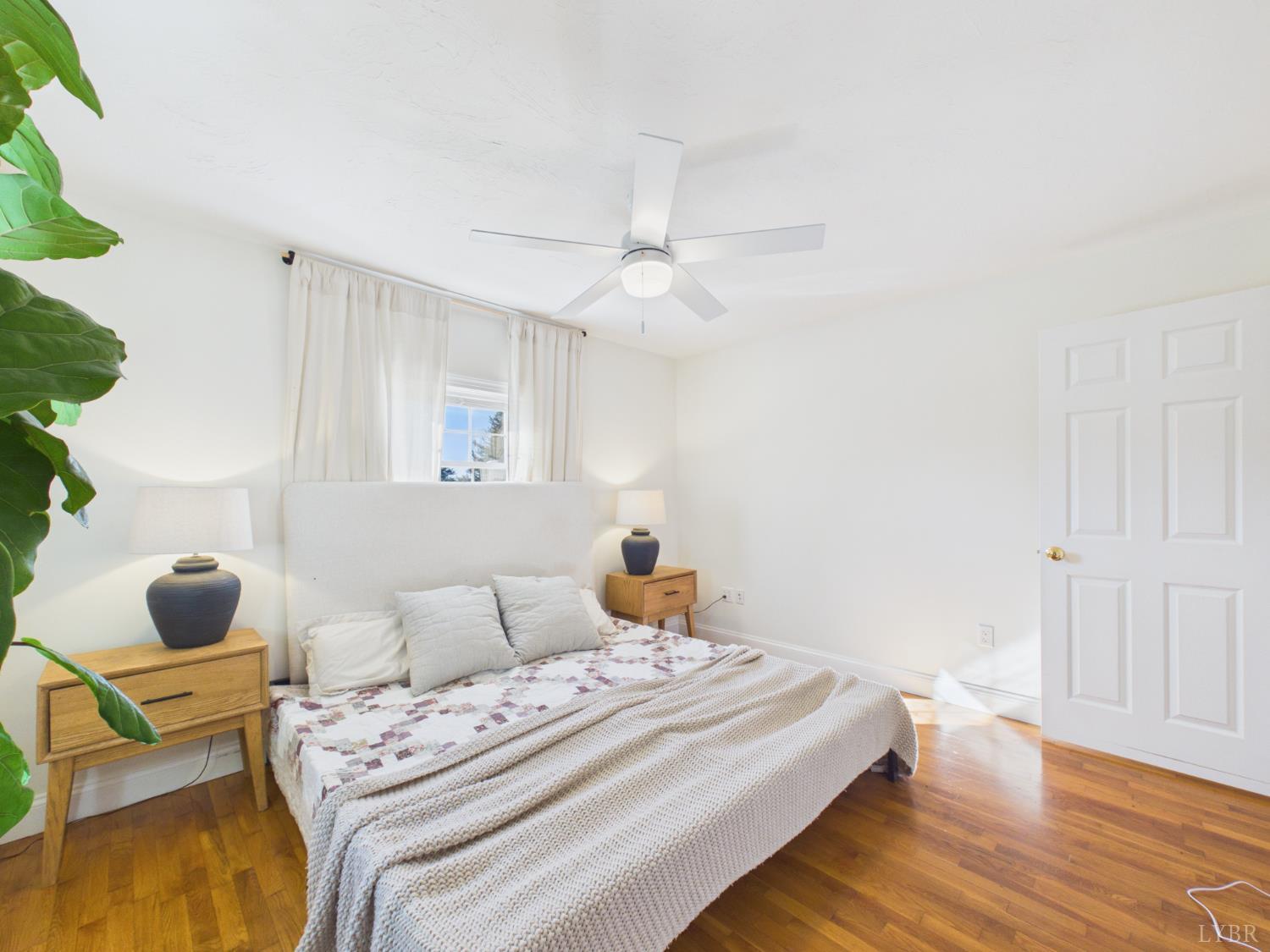 1482 First Rock Road Prospect, VA 23960 - Photo 5 of 30 a bedroom with a bed and wooden floor