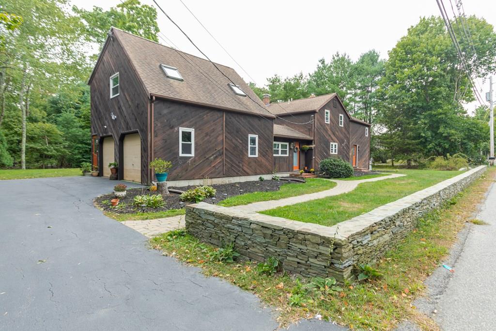 50 Forest Street Bridgewater, MA 02324 - Photo 1 of 42 a front view of house with yard and green space