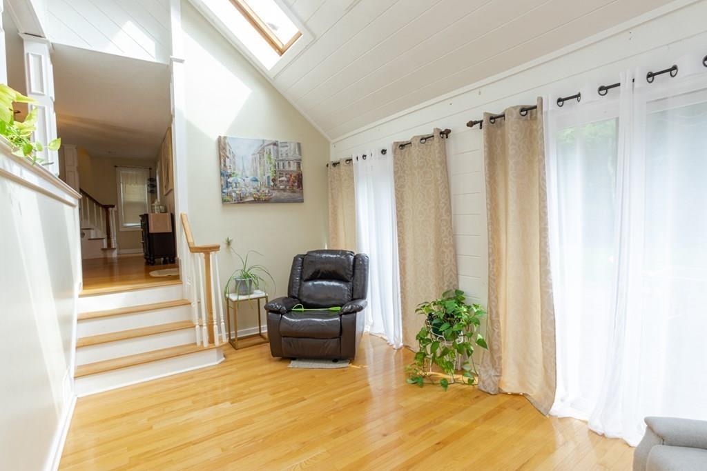 50 Forest Street Bridgewater, MA 02324 - Photo 15 of 42 a living room with furniture and a fireplace