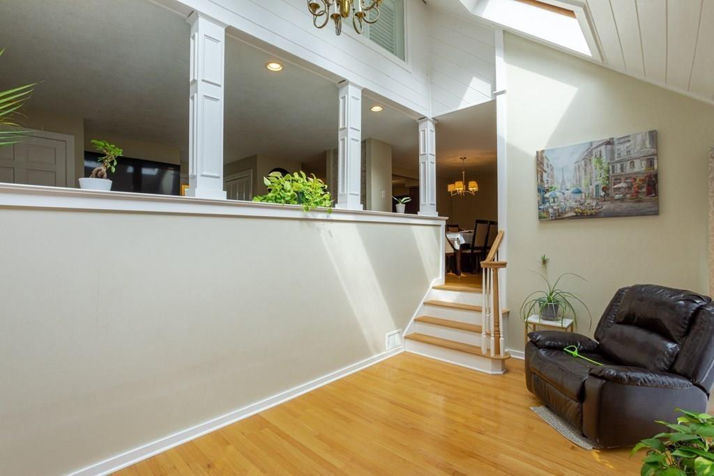 50 Forest Street Bridgewater, MA 02324 - Photo 16 of 42 a view of staircase with furniture and wooden floor