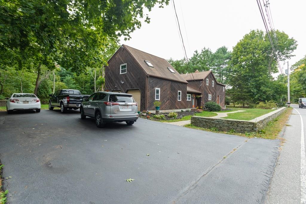 50 Forest Street Bridgewater, MA 02324 - Photo 2 of 42 a view of a car parked in front of house
