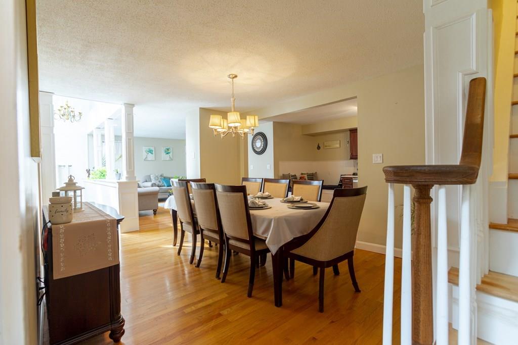50 Forest Street Bridgewater, MA 02324 - Photo 23 of 42 a view of a a dining room with furniture window and wooden floor