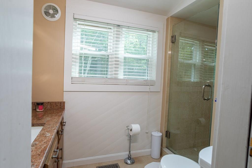 50 Forest Street Bridgewater, MA 02324 - Photo 25 of 42 a bathroom with a toilet and a shower