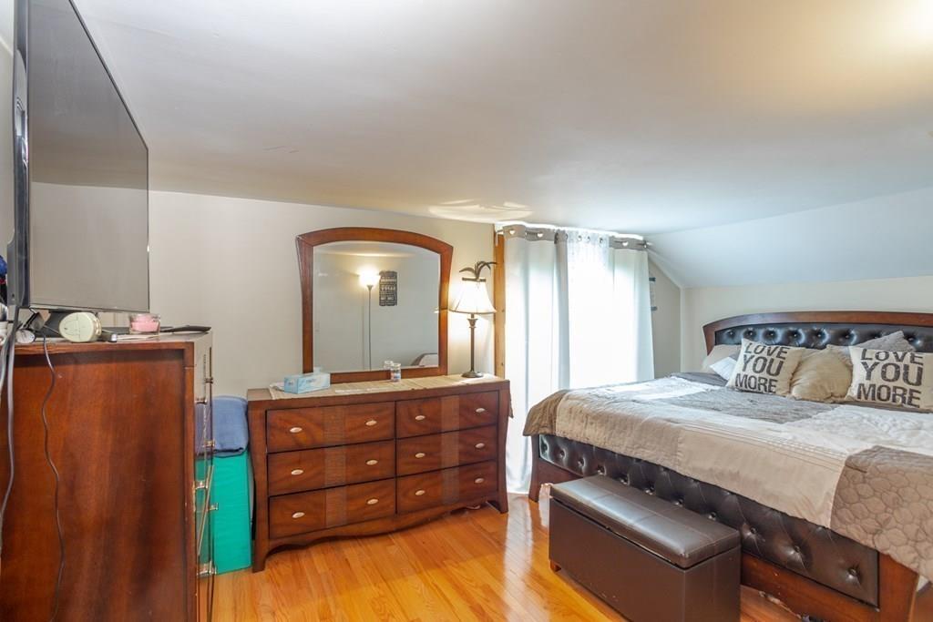 50 Forest Street Bridgewater, MA 02324 - Photo 29 of 42 a bedroom with a bed and a dresser