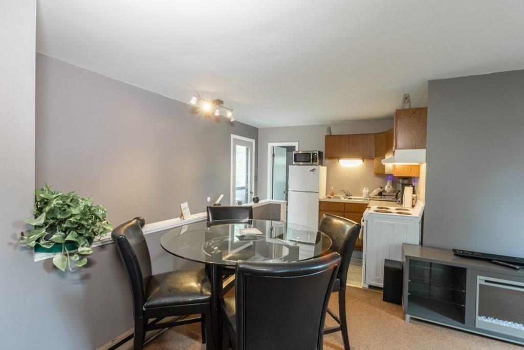 50 Forest Street Bridgewater, MA 02324 - Photo 39 of 42 a kitchen with a table and chairs in it