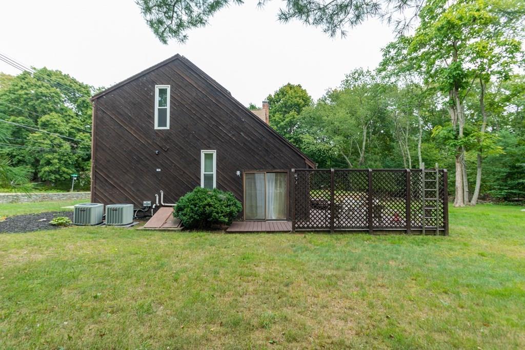50 Forest Street Bridgewater, MA 02324 - Photo 4 of 42 a view of a house with a yard