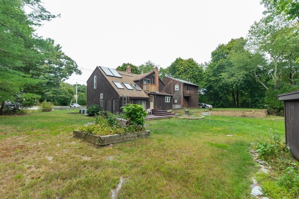 50 Forest Street Bridgewater, MA 02324 - Photo 6 of 42 a front view of a house with garden