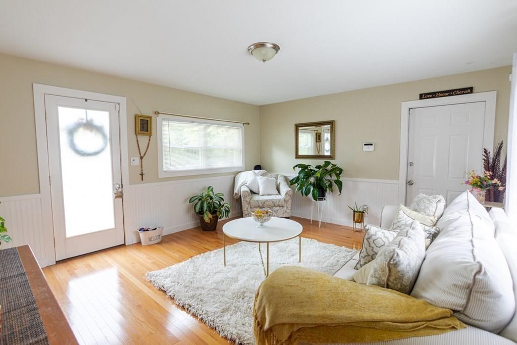 50 Forest Street Bridgewater, MA 02324 - Photo 7 of 42 a living room with furniture and a potted plant