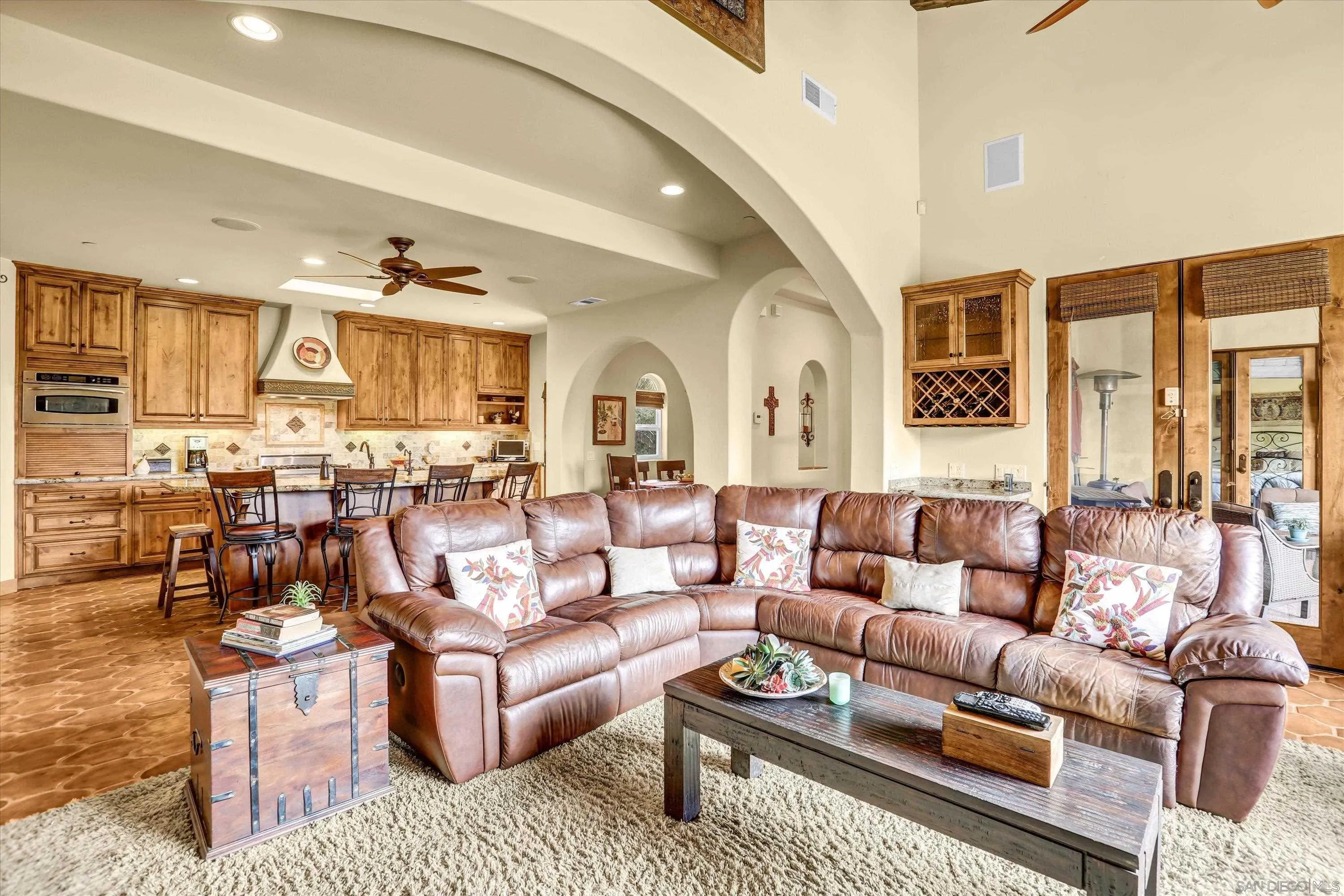 584 South Grade Road Alpine, CA 91901 - Photo 10 of 39 a living room with furniture kitchen view and large windows