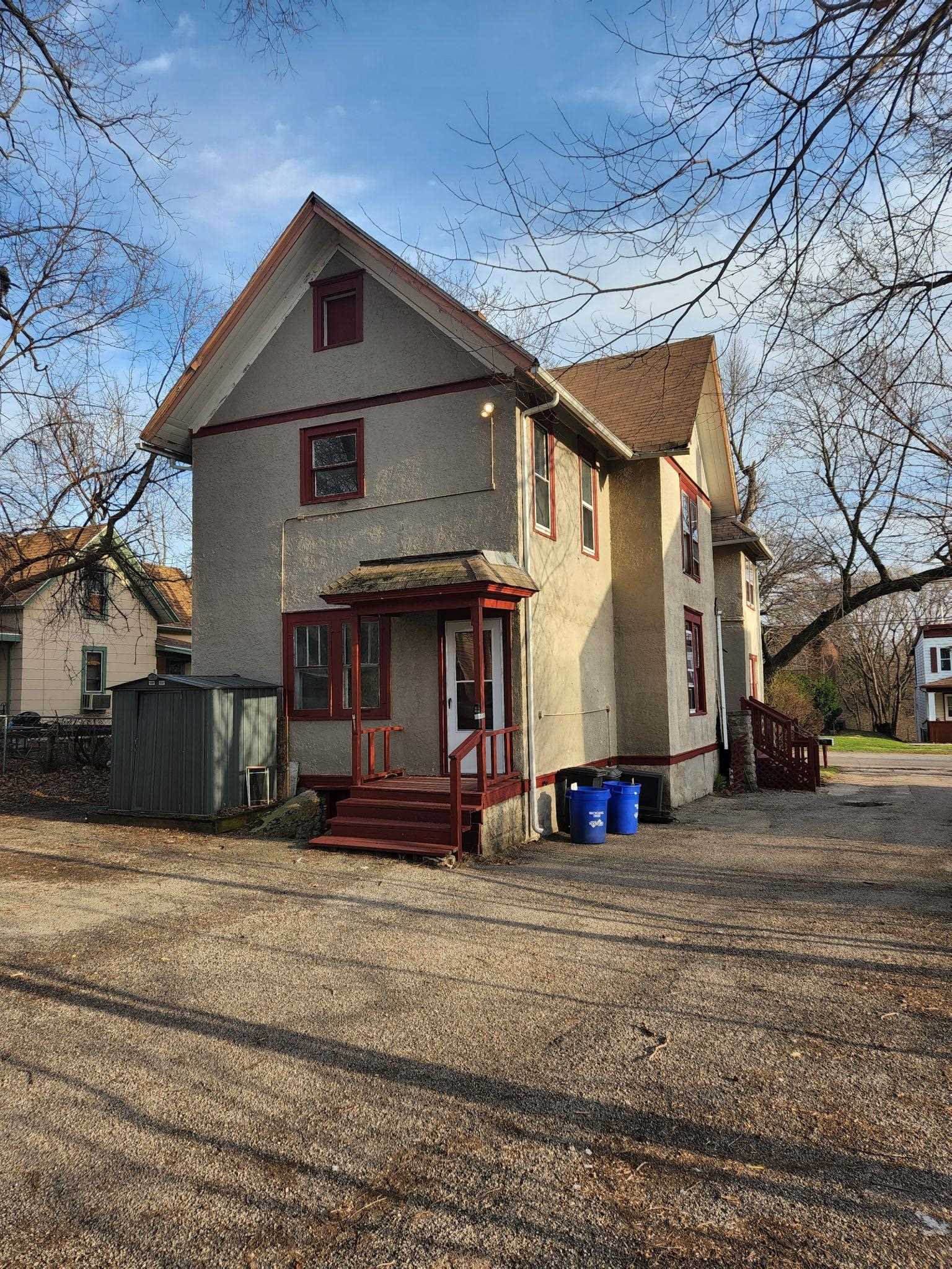 1410 Rural Street Rockford, IL 61107 - Photo 3 of 15 a front view of a house with a yard