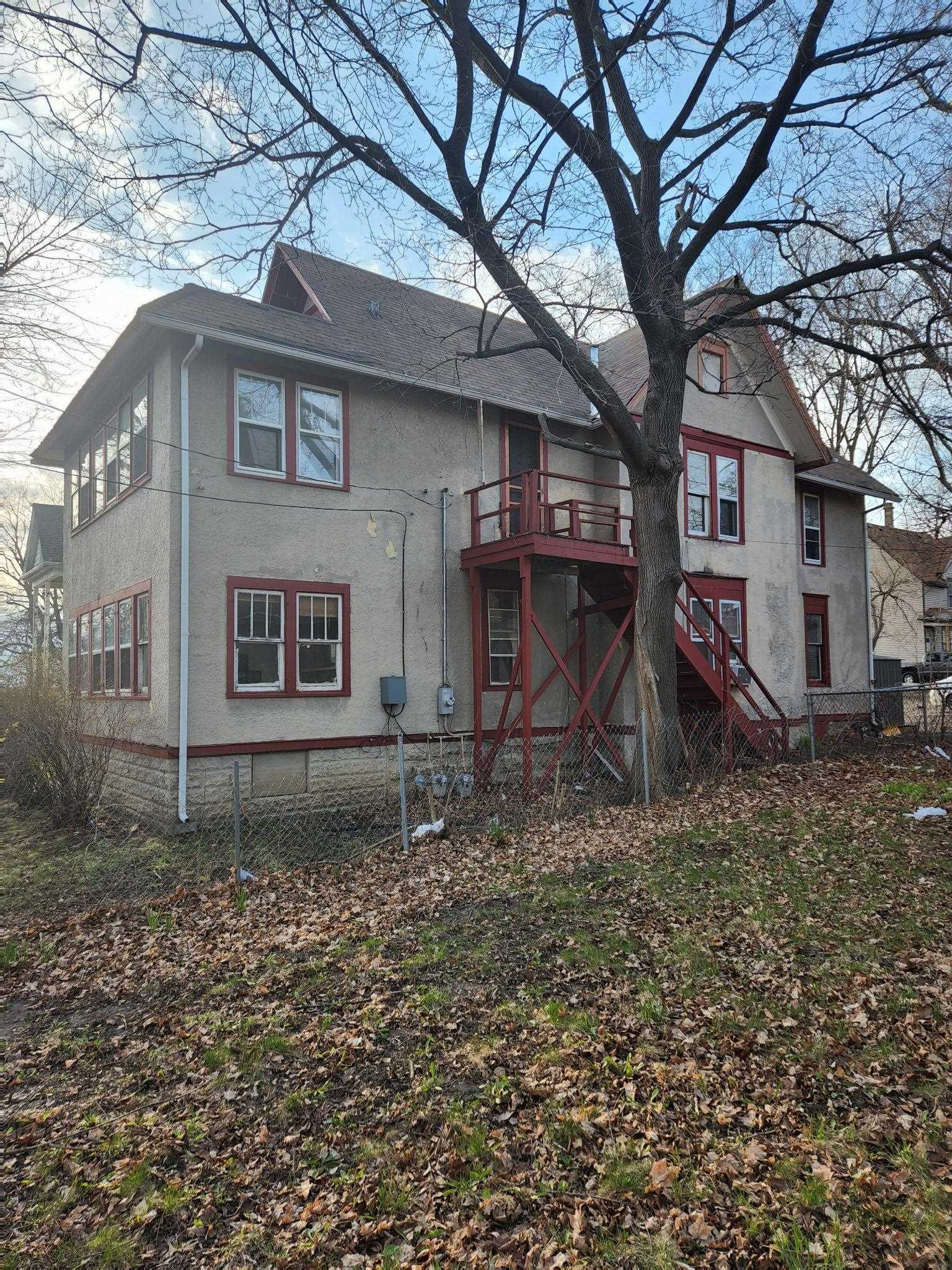 1410 Rural Street Rockford, IL 61107 - Photo 4 of 15 a view of a house with a yard