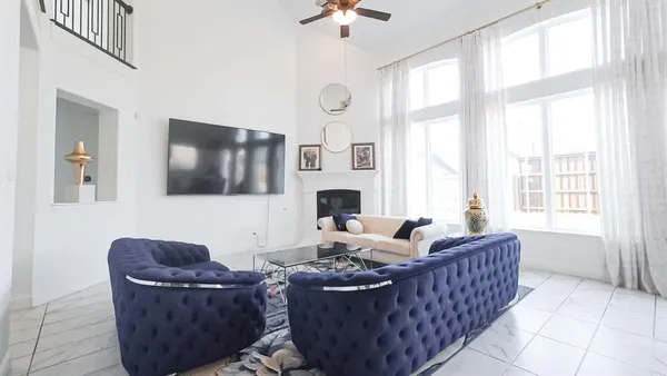 a bedroom with a bed and a mirror