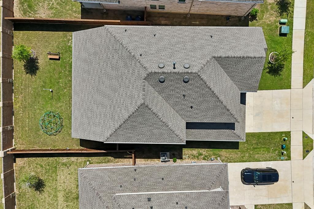 425 Breeds Hl Road Little Elm, TX 75068 - Photo 34 of 38 an aerial view of a house with a yard