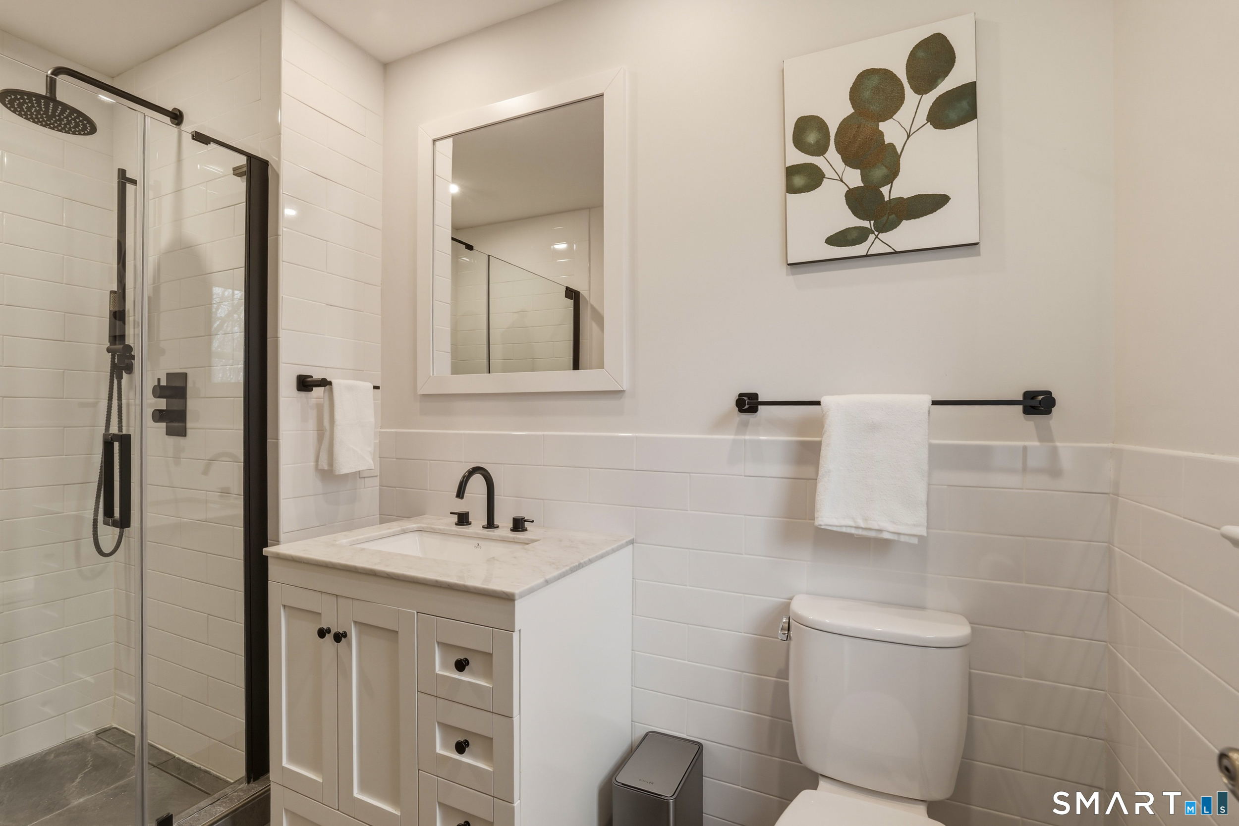 51 Sugar Loaf Road Guilford, CT 06437 - Photo 17 of 40 a bathroom with a sink toilet and shower