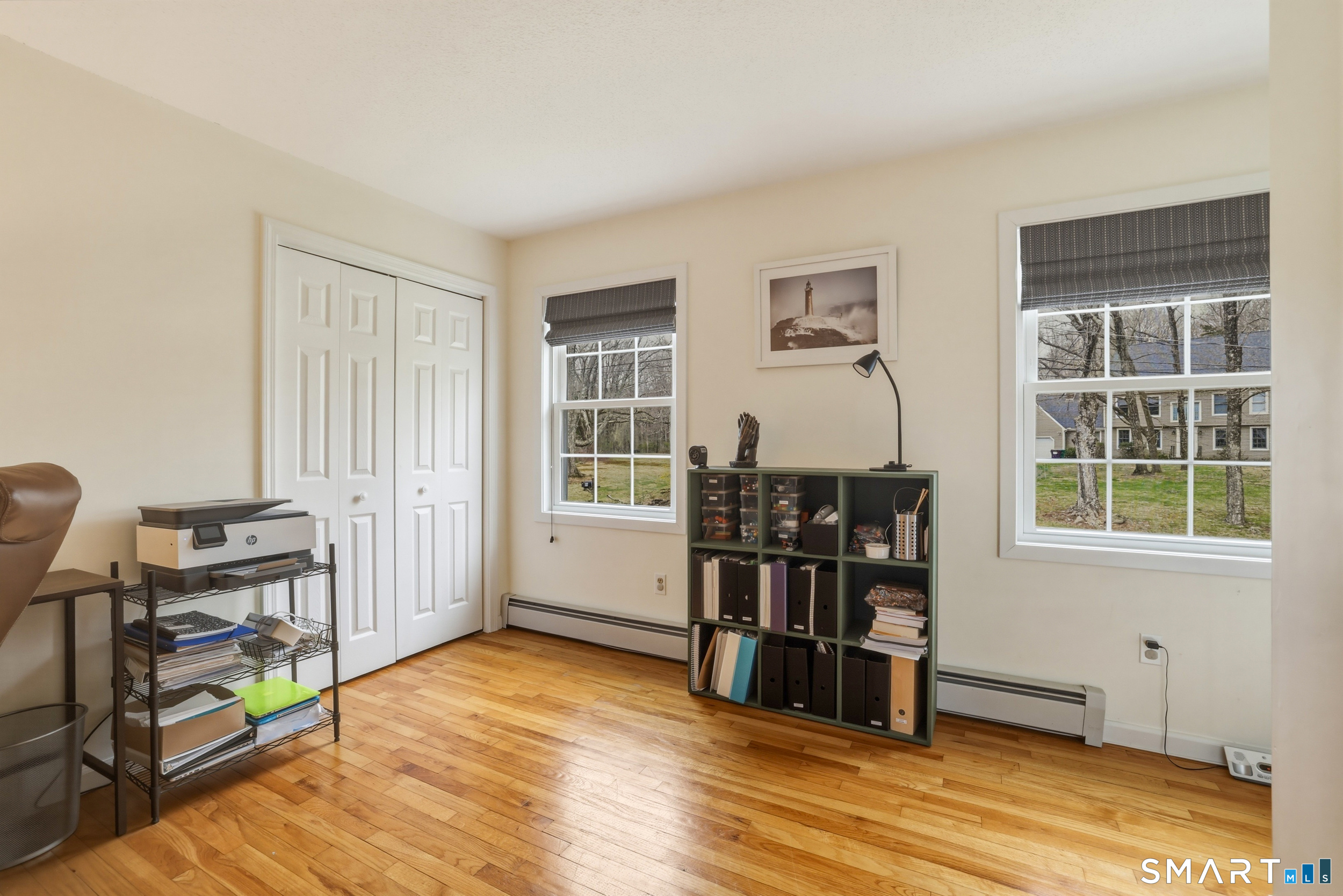 51 Sugar Loaf Road Guilford, CT 06437 - Photo 21 of 40 a view of a livingroom with furniture and windows