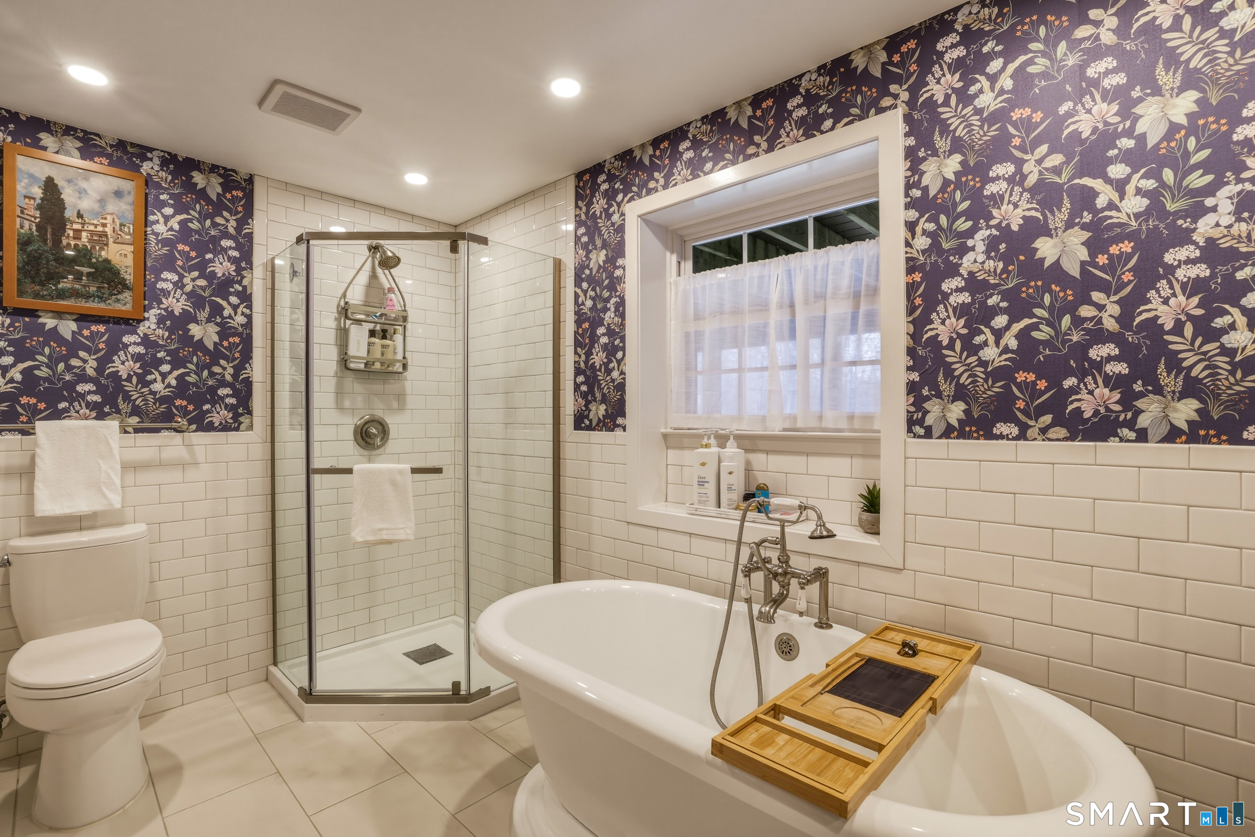 51 Sugar Loaf Road Guilford, CT 06437 - Photo 27 of 40 a bathroom with a bathtub and shower