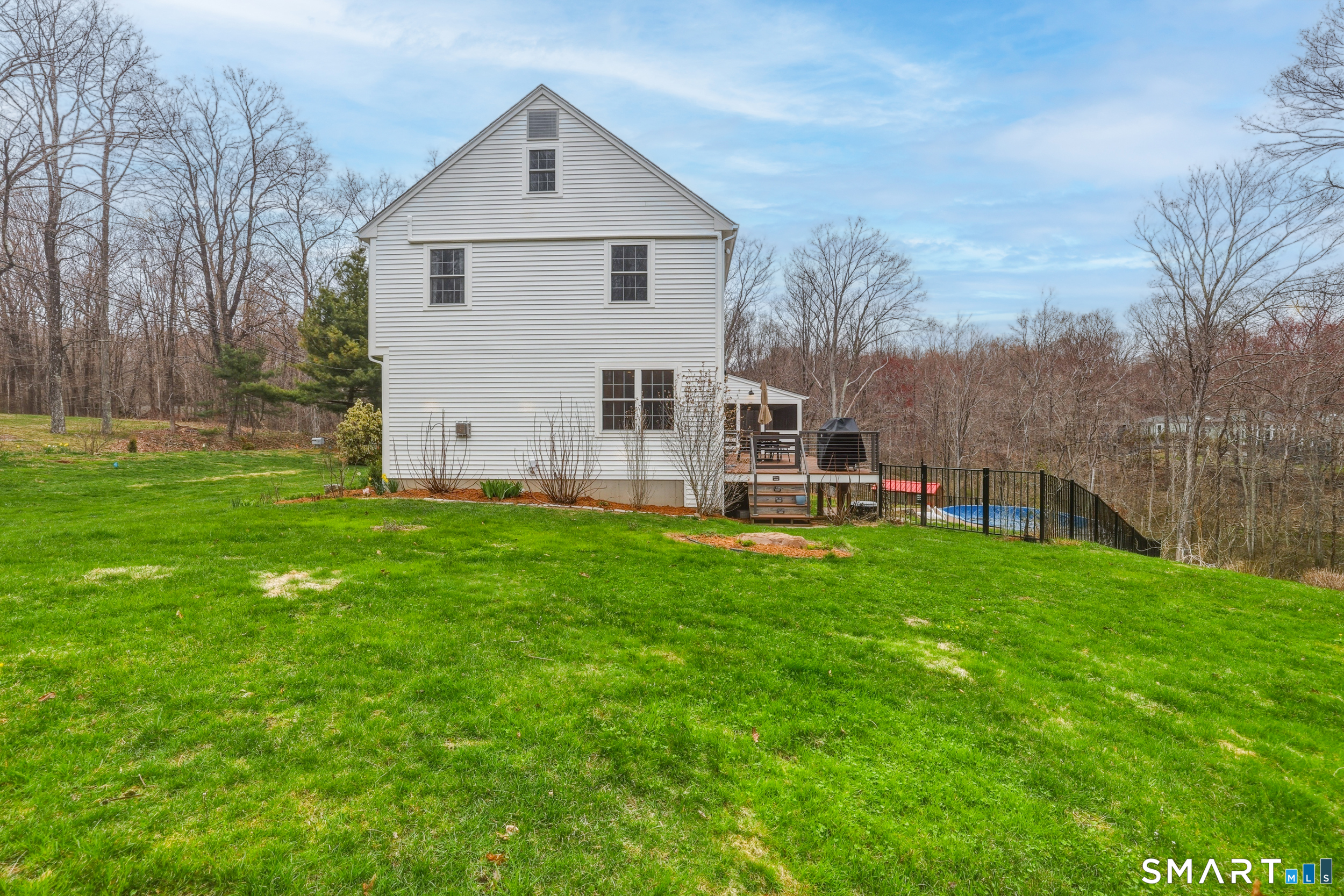 51 Sugar Loaf Road Guilford, CT 06437 - Photo 33 of 40 a view of a house with backyard and garden