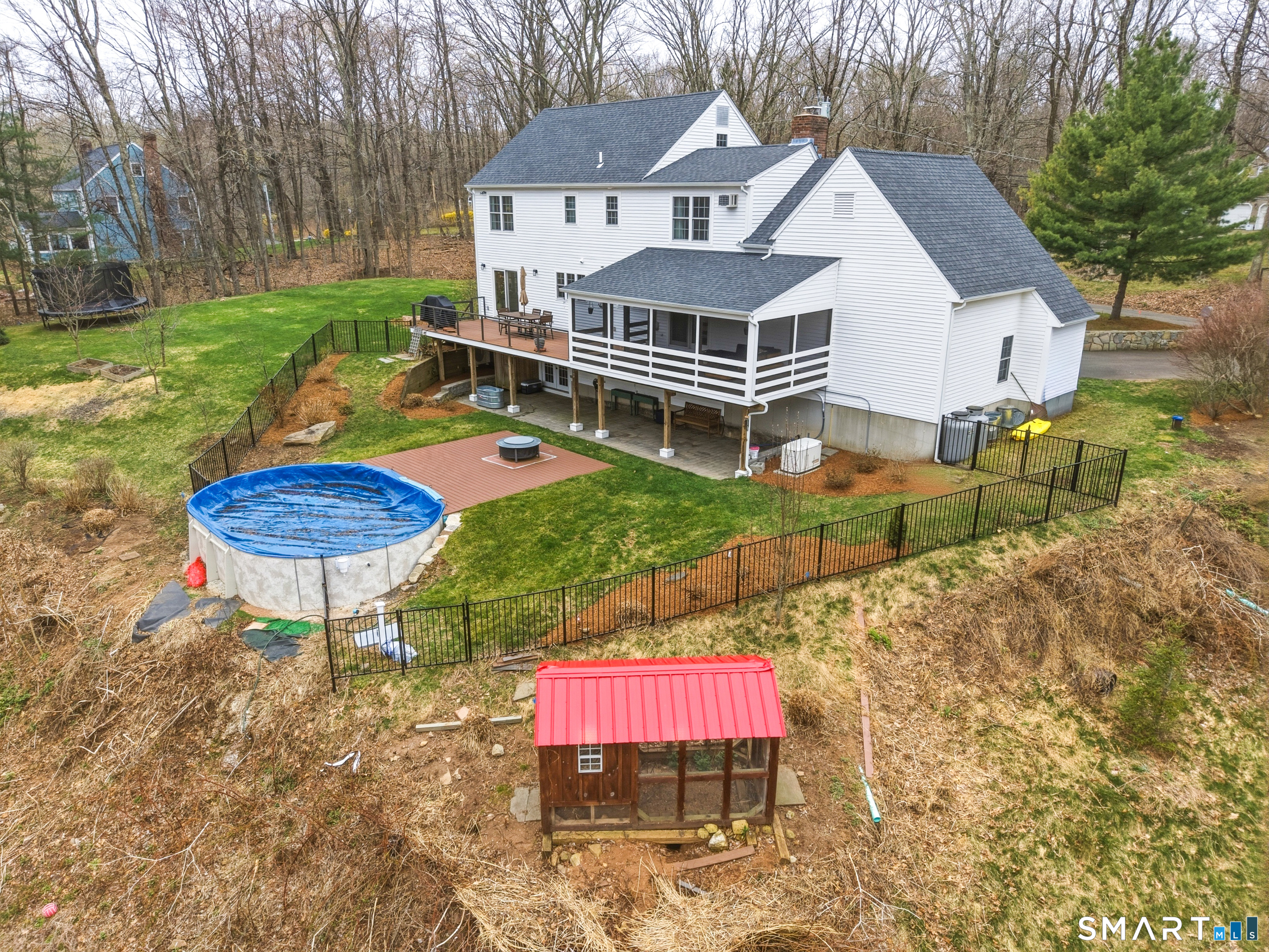 51 Sugar Loaf Road Guilford, CT 06437 - Photo 36 of 40 a front view of a house with garden