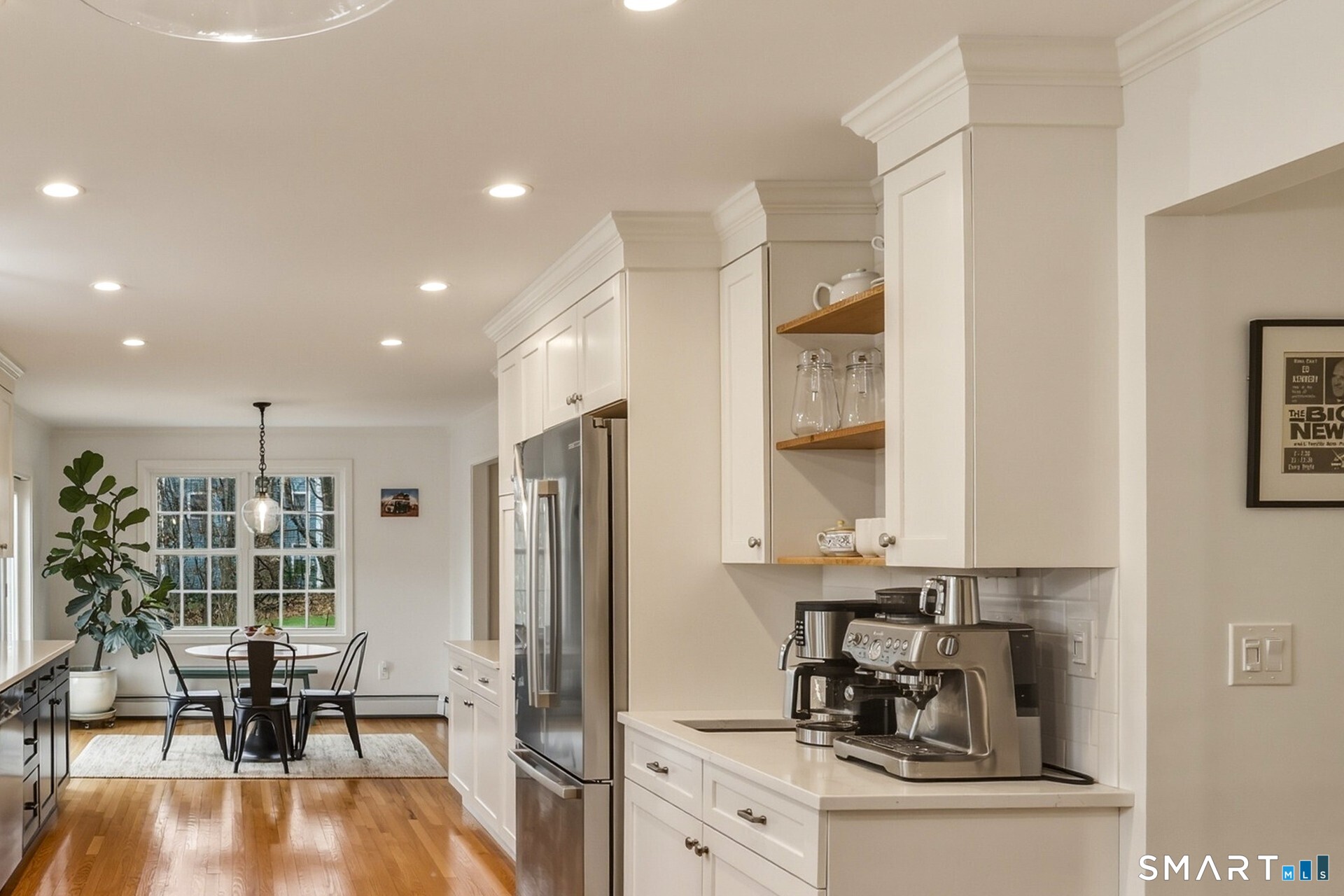 51 Sugar Loaf Road Guilford, CT 06437 - Photo 10 of 40 a kitchen with stainless steel appliances granite countertop a refrigerator and a stove top oven
