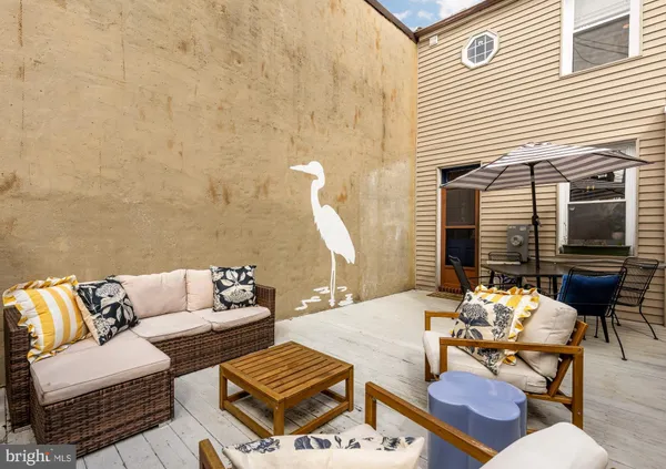 a outdoor living room with furniture