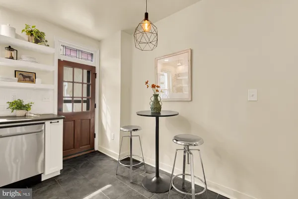 a view of a hallway with workspace