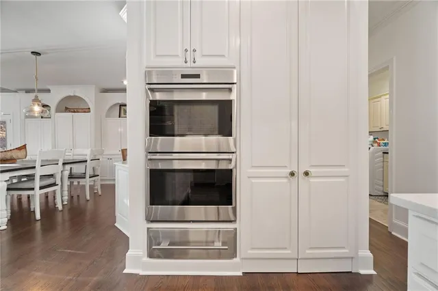 a kitchen with stainless steel appliances granite countertop a stove and a sink