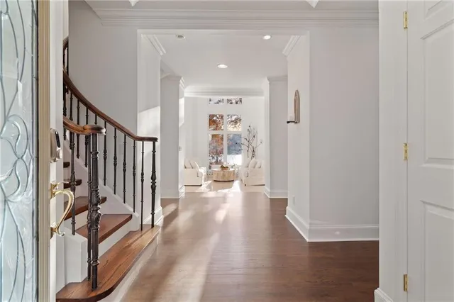 a living room with furniture and fireplace
