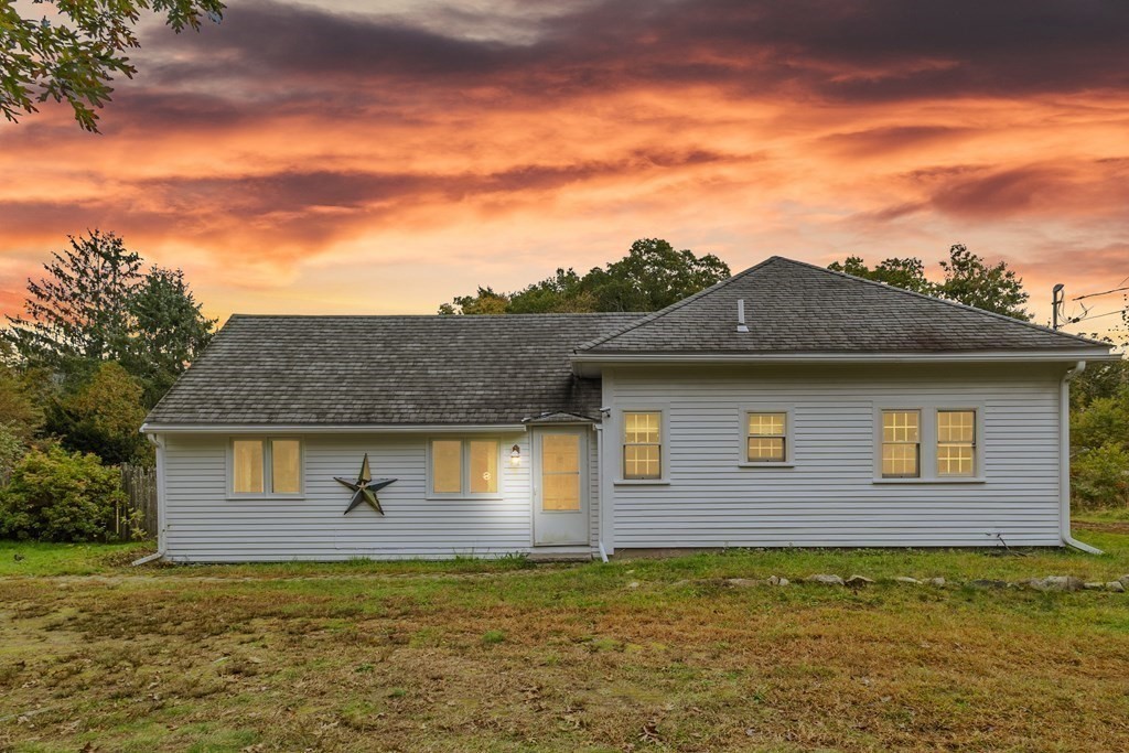 18 Pierceville Road Wareham, MA 02576 - Photo 23 of 29 a front view of a house with a yard