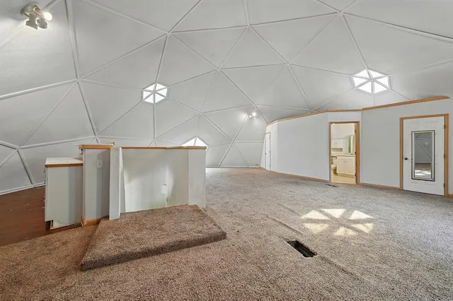 a view of a livingroom with a staircase