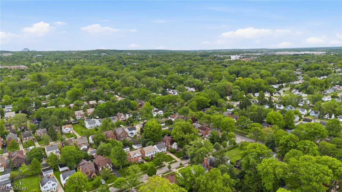 3713 Winchell Road Shaker Heights, OH 44122 - Photo 31 of 38 Expansive residential area featuring a dense tree canopy, a network of streets, and various architectural styles under a clear sky
