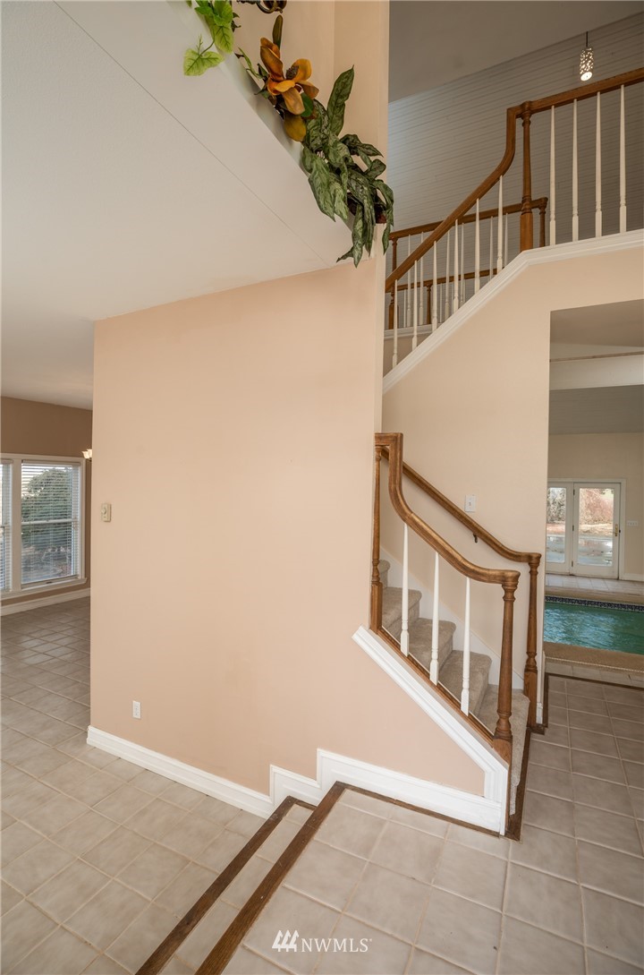 890 South Lucy Road Othello, WA 99344 - Photo 17 of 40 a view of staircase with white walls