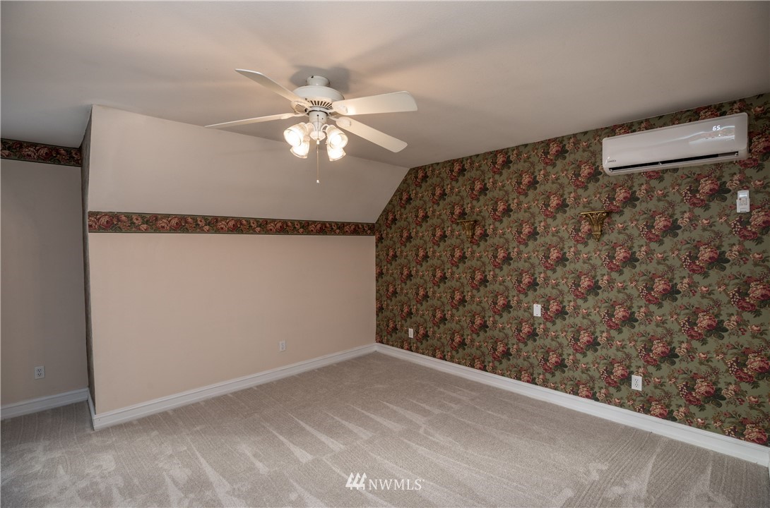 890 South Lucy Road Othello, WA 99344 - Photo 34 of 40 a view of a ceiling fan in a room