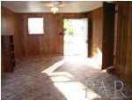 7511 Sachem Road Pensacola, FL 32506 - Photo 5 of 8 Looking thru den to side entrance