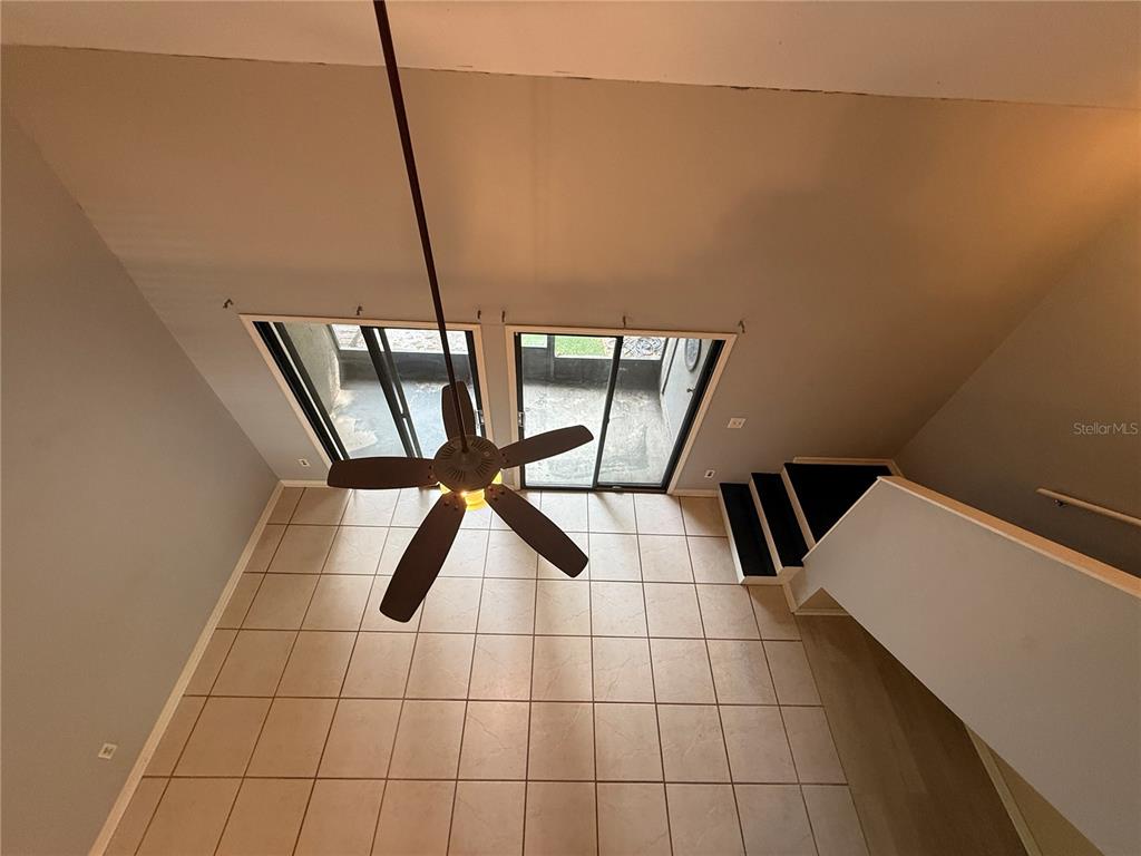 7200 Southwest 8th Avenue, Unit T128 Gainesville, FL 32607 - Photo 31 of 38 a view of an empty room with wooden floor
