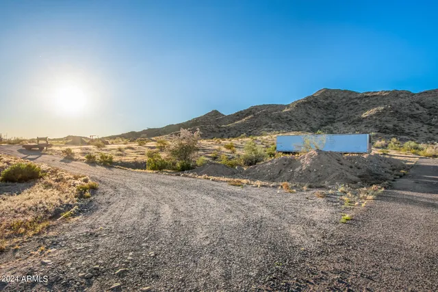 a view of a road with an ocean view