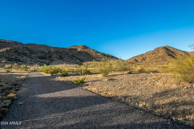 a view of mountain view with mountains in the background