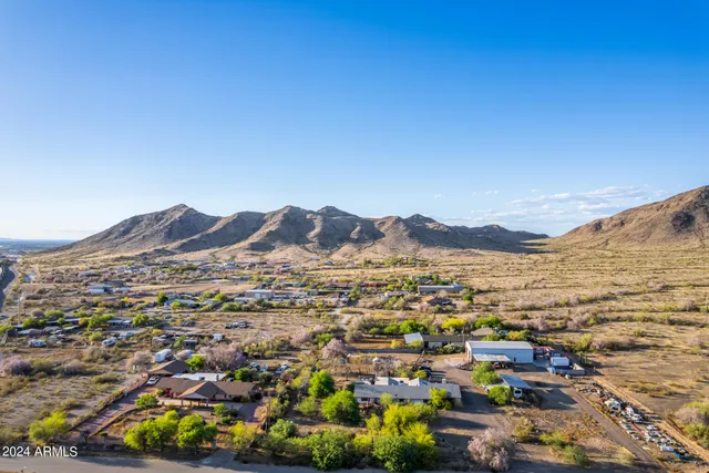 a view of a city with mountains in the background