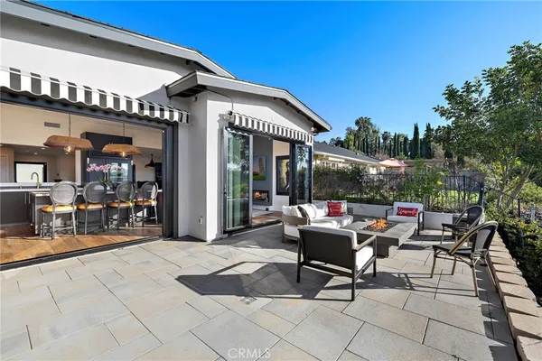 a view of a dinning table and chair in the patio
