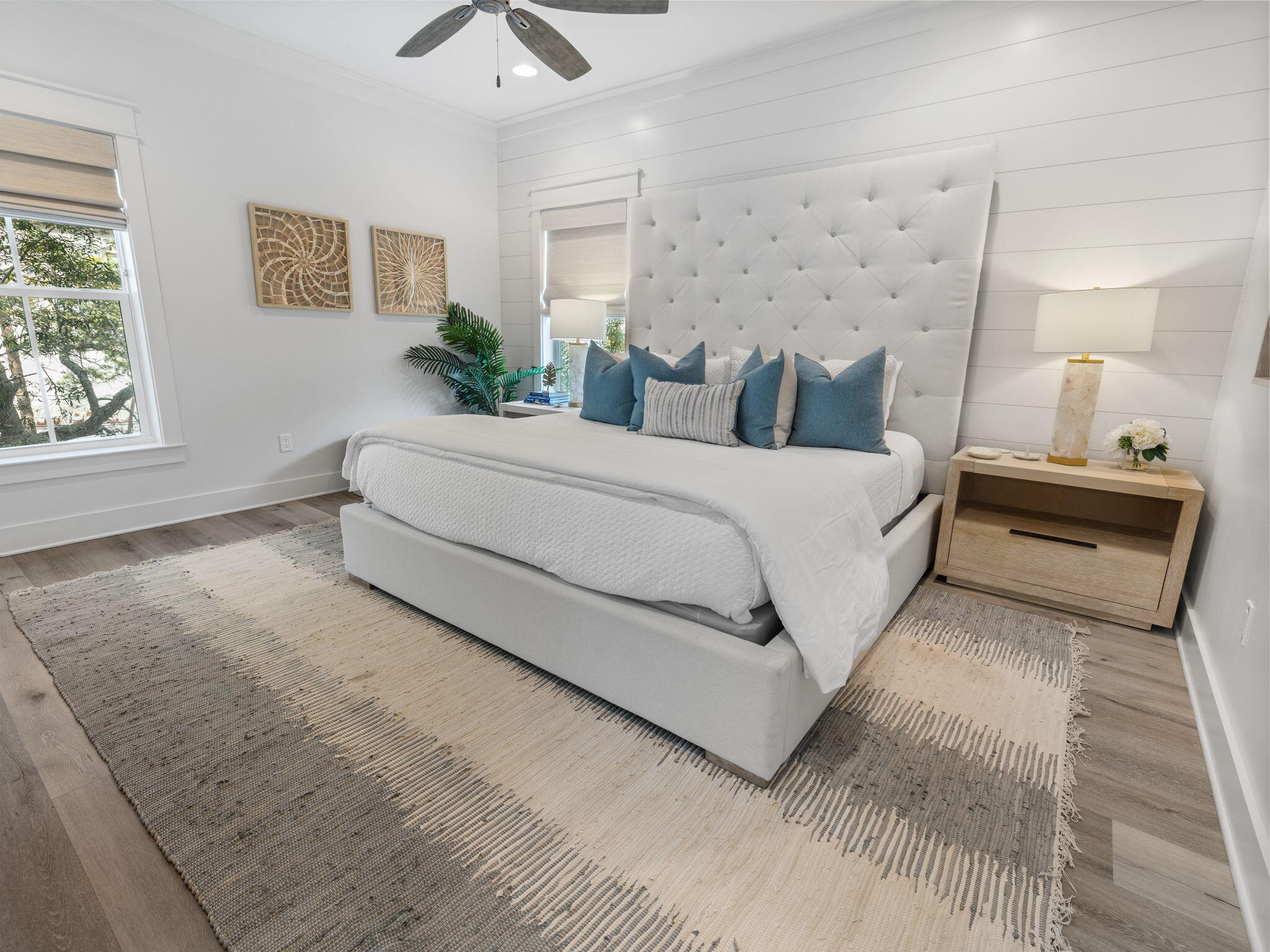 45 Canopy Ln Inlet Beach Inlet Beach, FL 32461 - Photo 5 of 11 a spacious bedroom with a bed and a chandelier