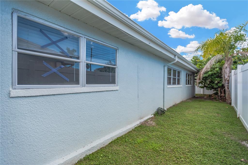 16214 3rd Street East Redington Beach, FL 33708 - Photo 30 of 30 a view of backyard with a large tree