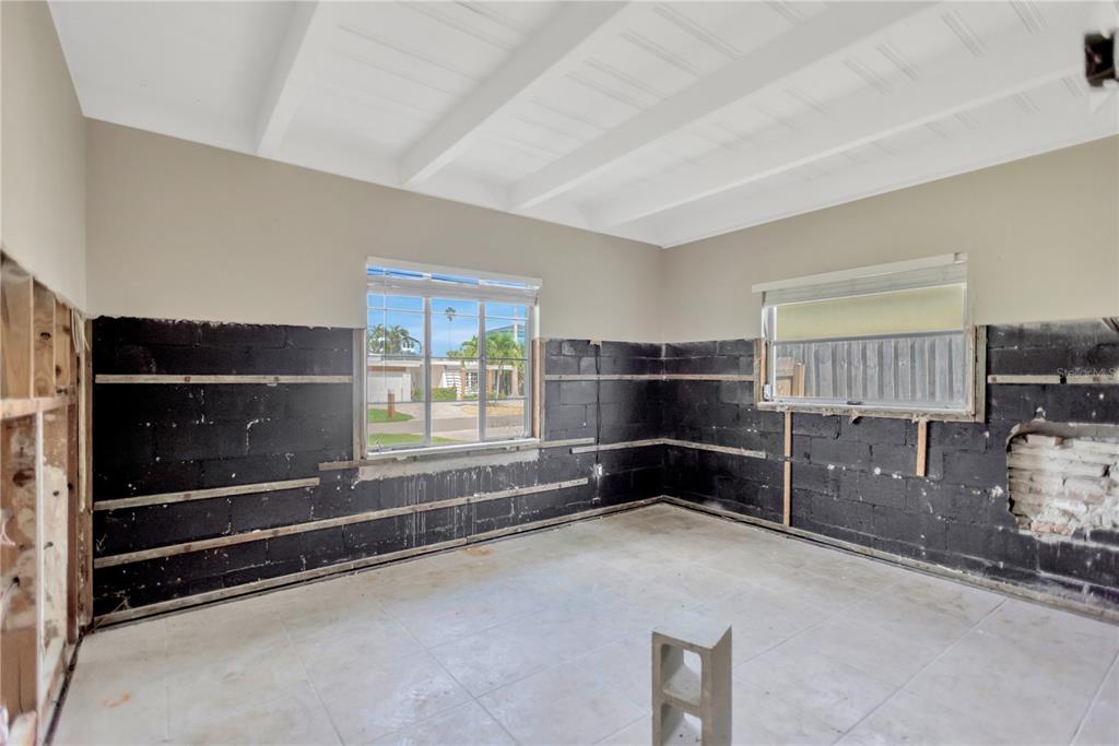 16214 3rd Street East Redington Beach, FL 33708 - Photo 7 of 30 a room with furniture and a window