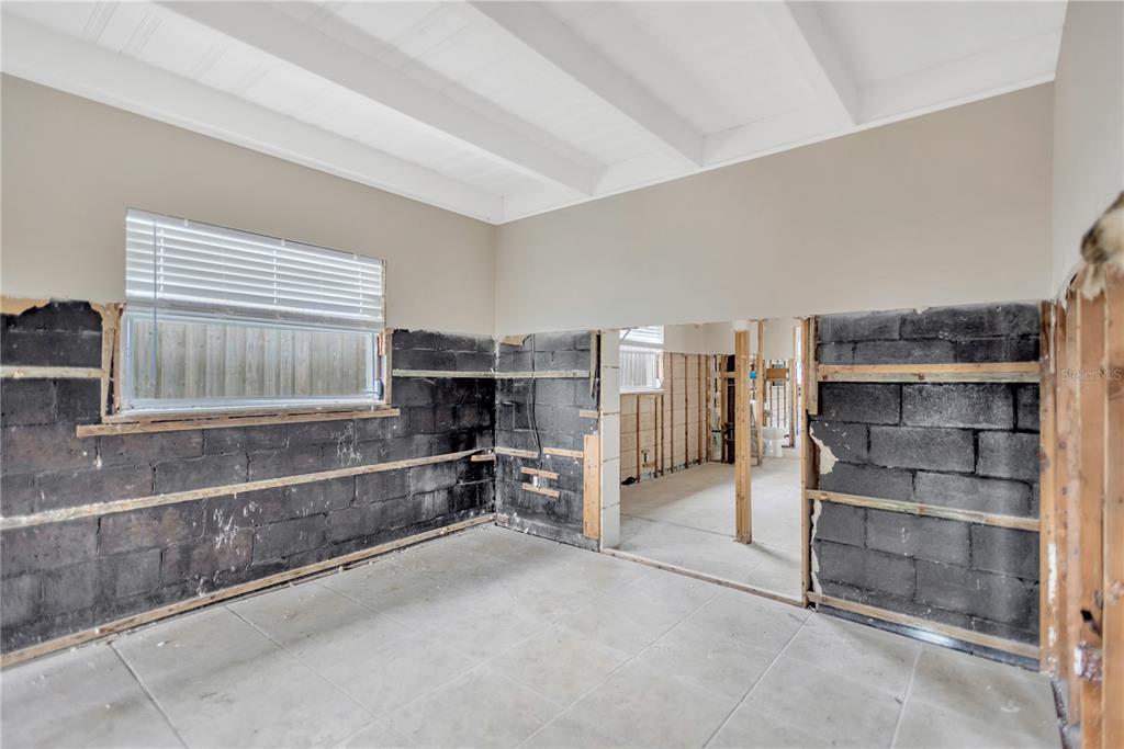 16214 3rd Street East Redington Beach, FL 33708 - Photo 10 of 30 a view of walk in closet with empty racks
