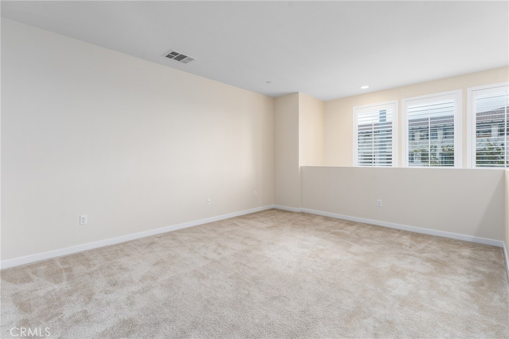 4956 Arrow Highway, Unit G Montclair, CA 91763 - Photo 14 of 32 an empty room with a window