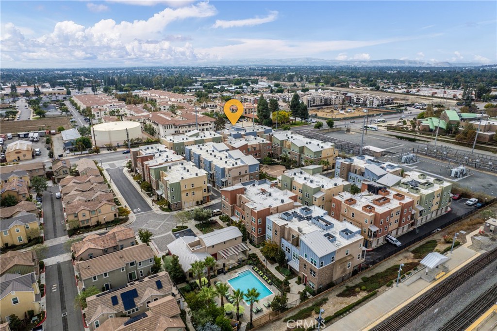 4956 Arrow Highway, Unit G Montclair, CA 91763 - Photo 31 of 32 an aerial view of a city with lots of residential buildings