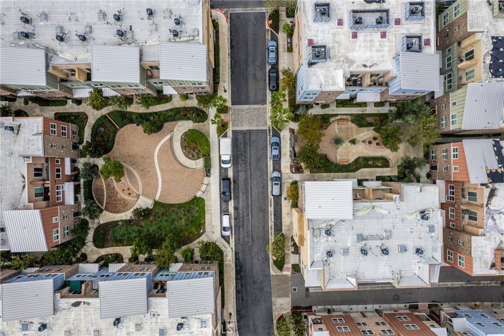 4956 Arrow Highway, Unit G Montclair, CA 91763 - Photo 32 of 32 an aerial view of residential house with outdoor space and parking