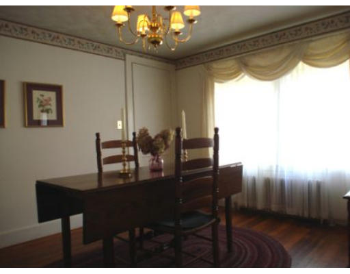 105 Spring Street Lexington, MA 02421 - Photo 5 of 18 a view of a dining room with furniture
