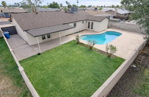 a view of a backyard with a tub
