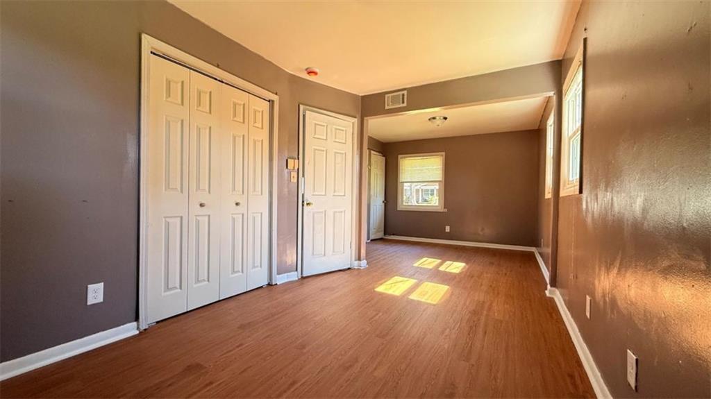 4183 O'Hara Road Forest Park, GA 30297 - Photo 12 of 24 a view of a hallway with wooden floor