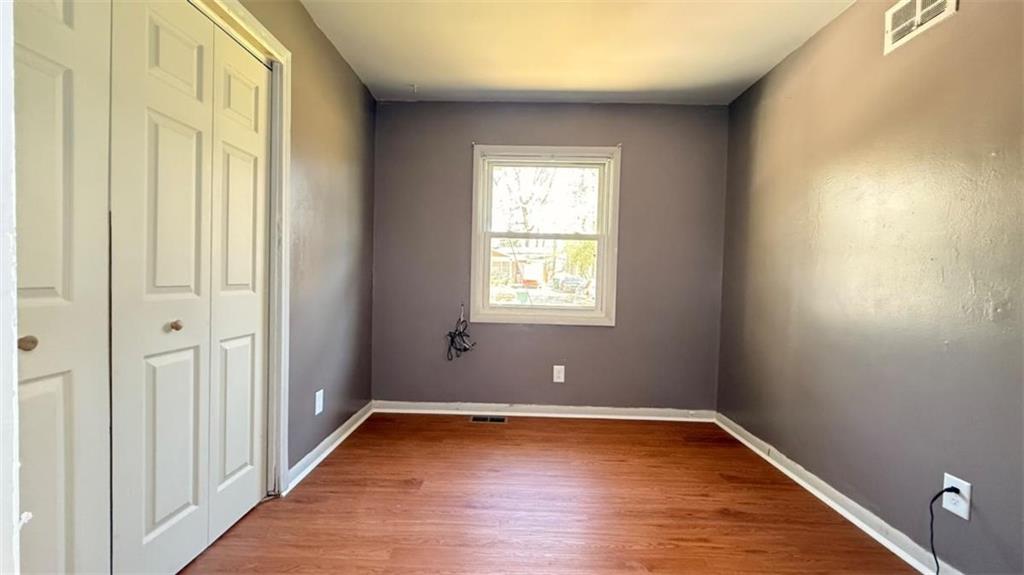 4183 O'Hara Road Forest Park, GA 30297 - Photo 9 of 24 a view of a room with wooden floor and window